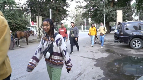 students walking in the streets of Cairo
