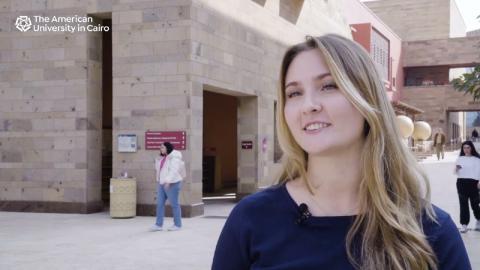 a blond girl smiling