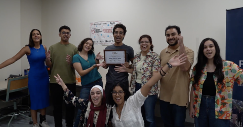 AUC students smiling and holding their Most Novel Idea certificate for their total artificial heart