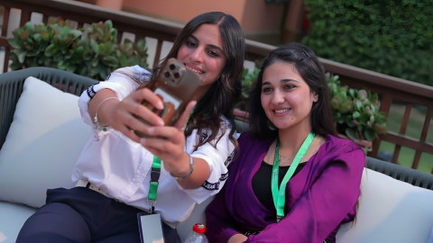 Two girls taking a selfie on a mobile