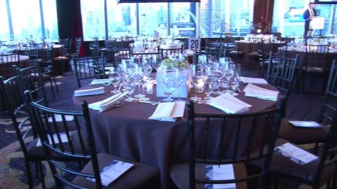 Set dining tables in a hall