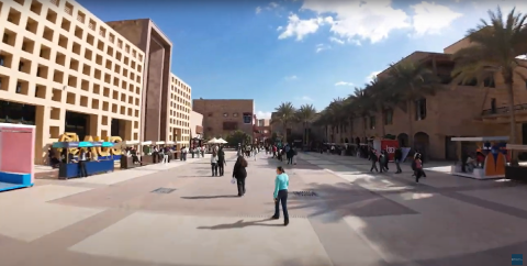 Students walking in the AUC Plaza