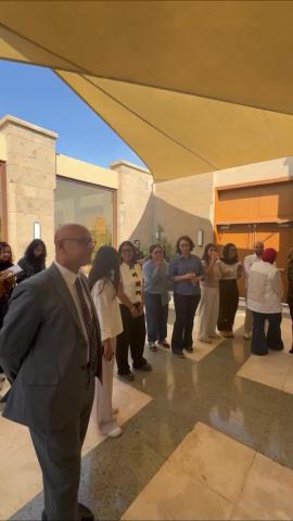 People standing and talking in a gathering