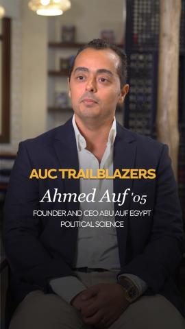 A man is sitting down. He is dressed in a suit. Text: AUC Trailblazer Ahmed Auf &lsquo;05, entrepreneur and CEO of Abu Auf