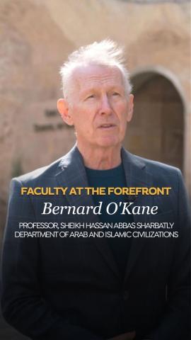 A male seems to be talking. Text: Faculty at the Front Bernard O&rsquo;Kane, Professor in the Sheikh Hassan Abbas Sharbatly Department of Arab and Islamic Civilizations