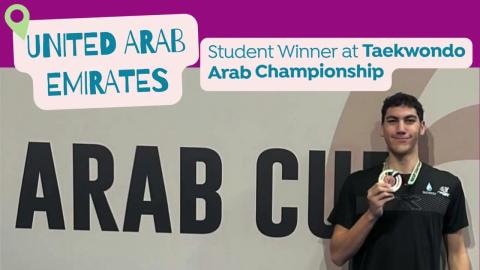 A male is standing and smiling and he is holding a medal. Text: United Arab Emirates. Student Winner at Taekwondo Arab Championship