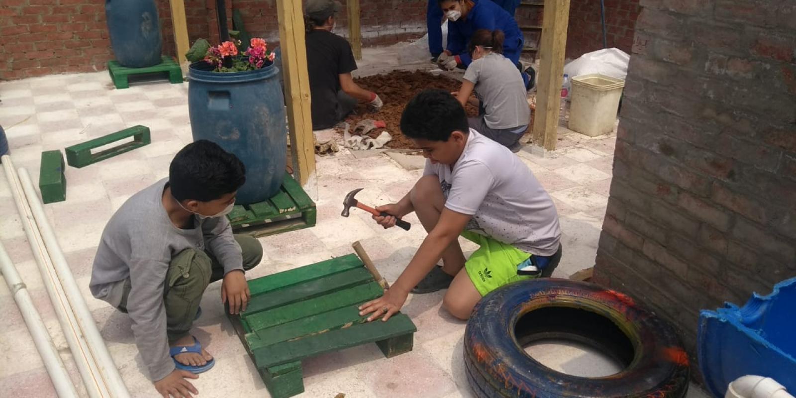 AUC Students Establish Sustainable Rooftop Community Garden in Informal Cairo Neighborhood