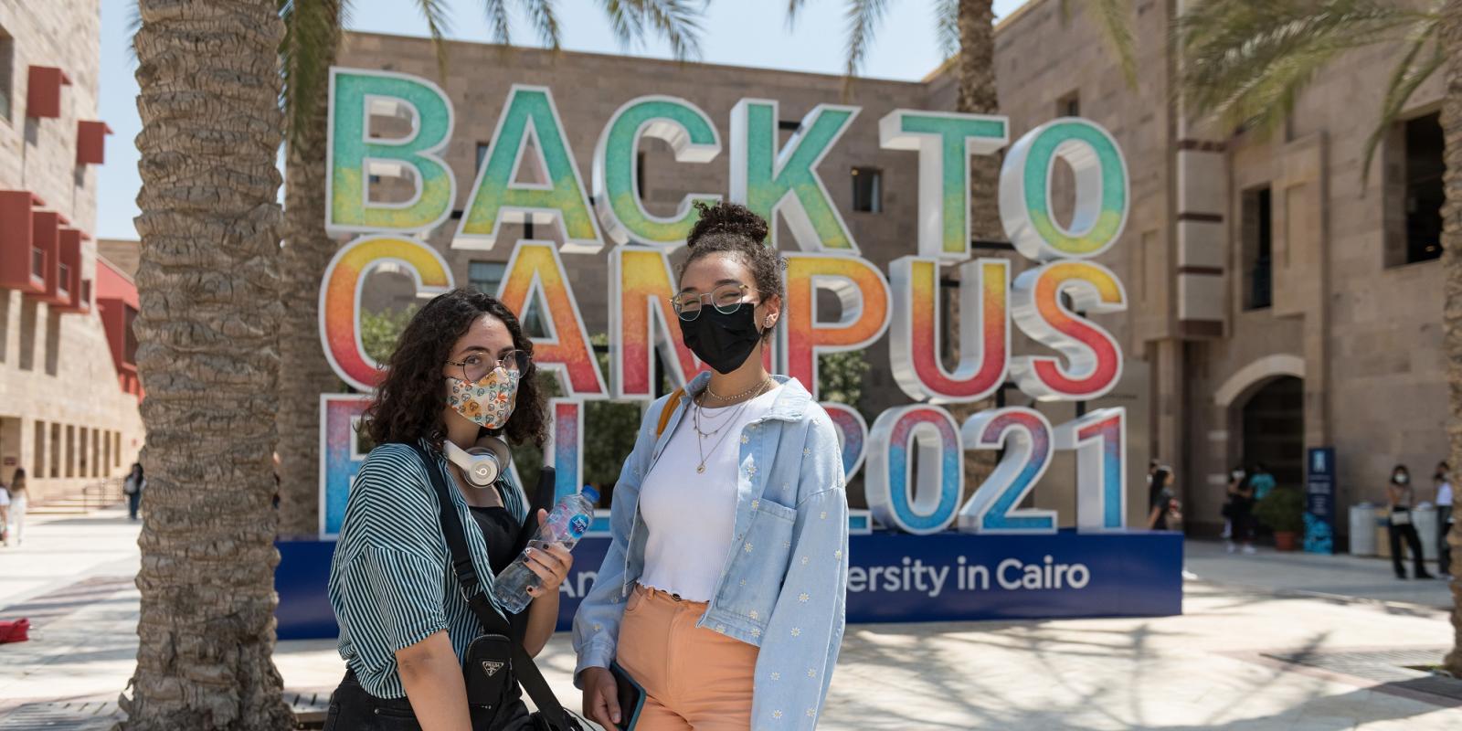 masked girls on campus