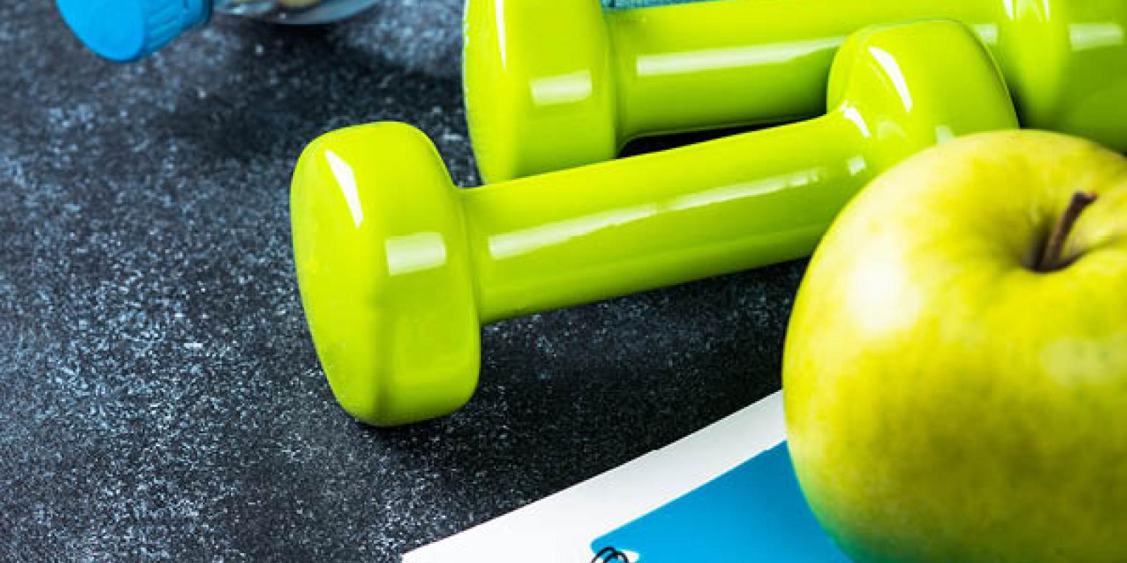 apple, dumbell and water bottle