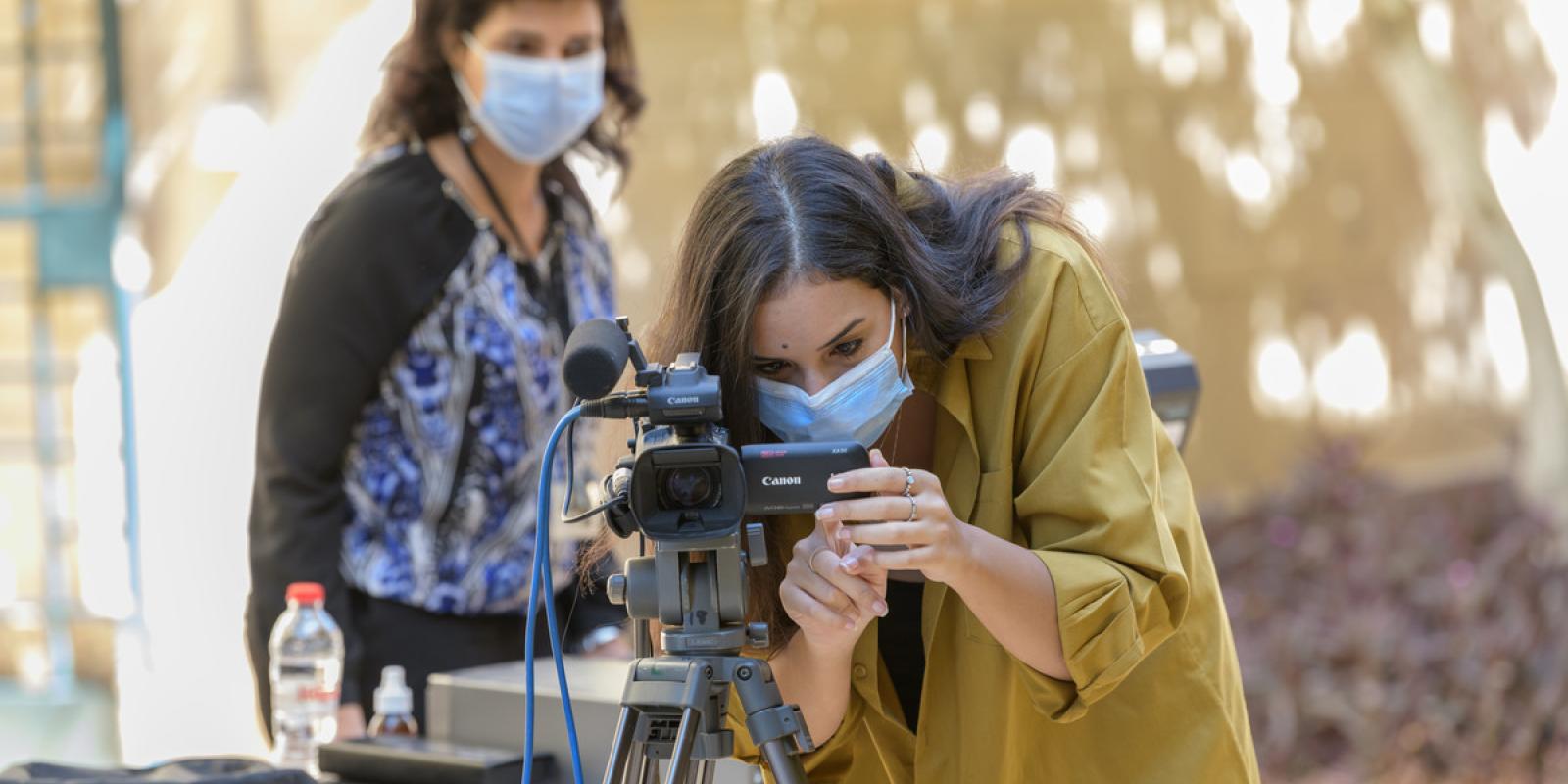 girl with video camera