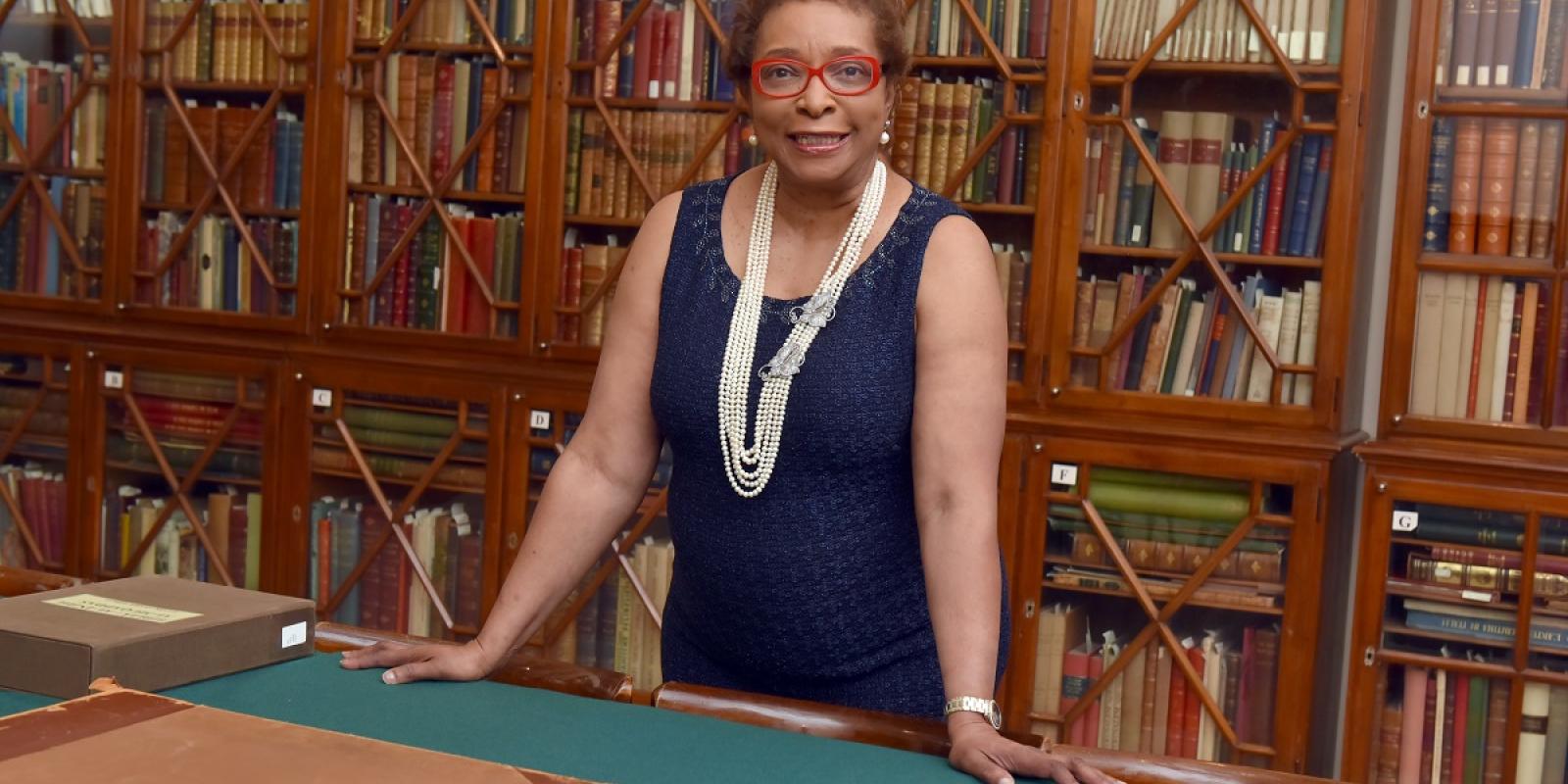 Woman standing in a library