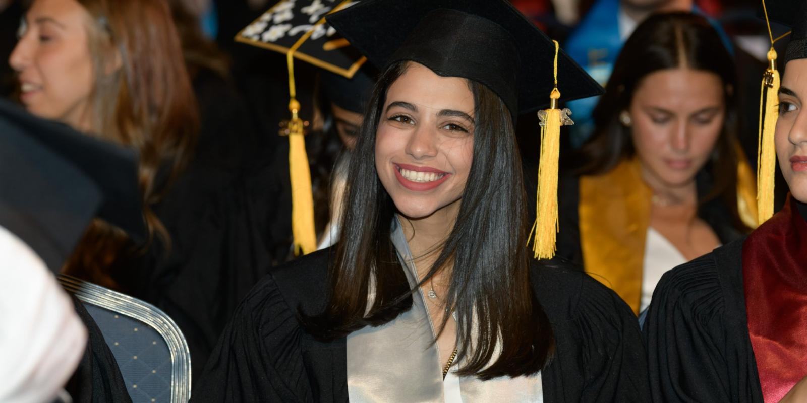 Female graduate at her commencement ceremony