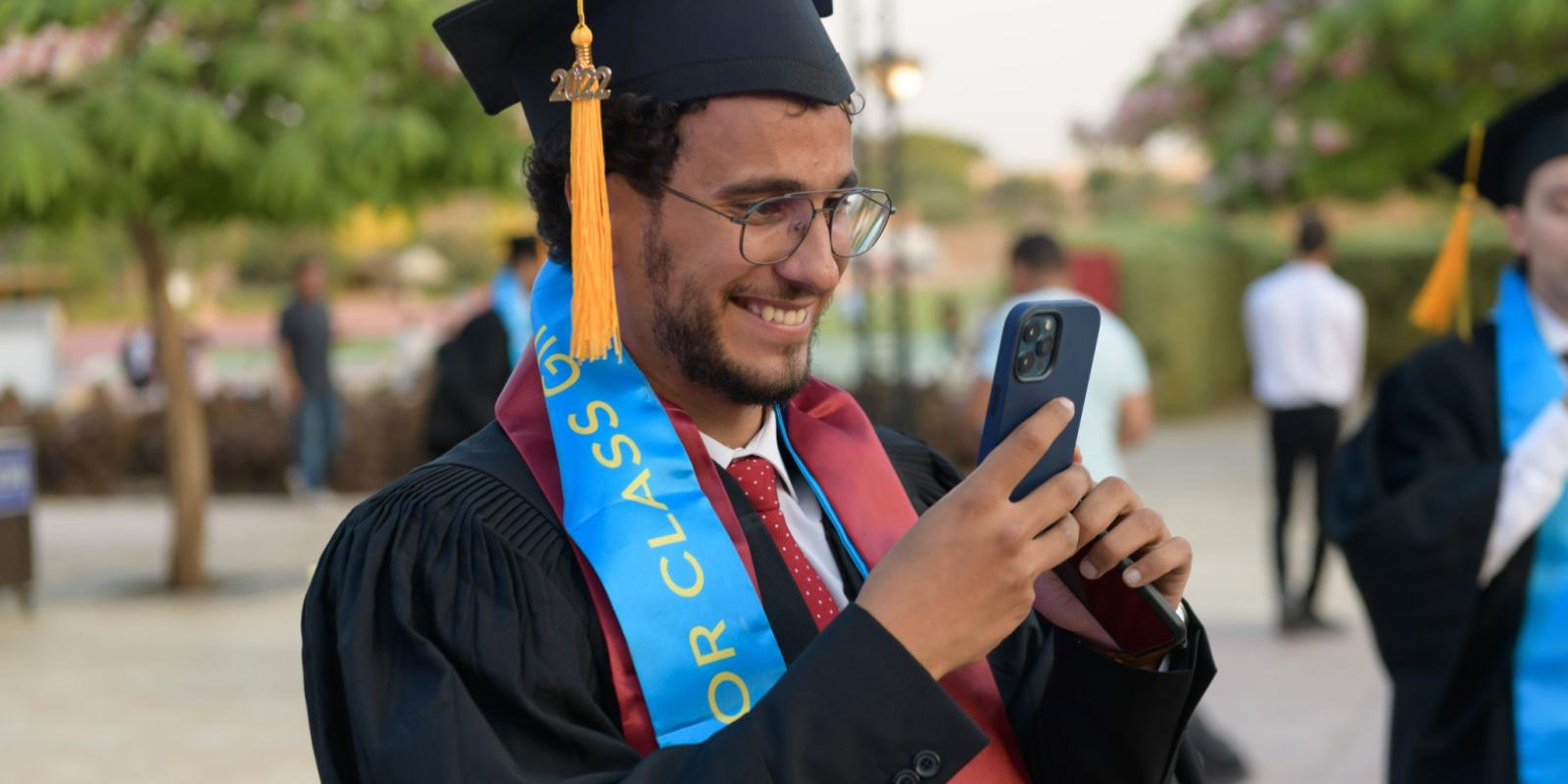 Male graduate in his cap and gown
