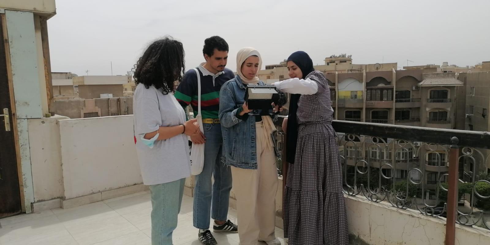 auc students filming camera workshop