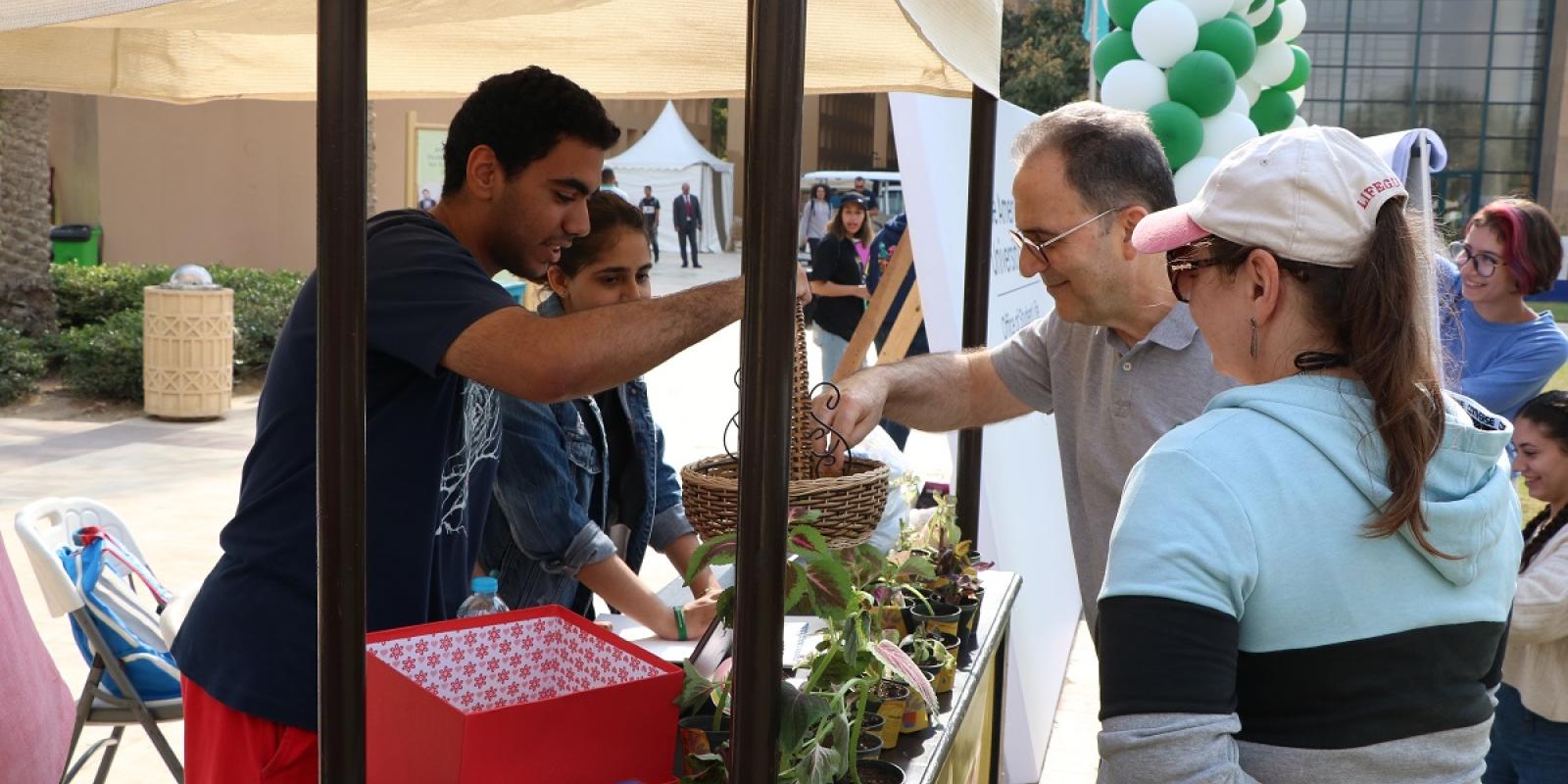 People looking at plants