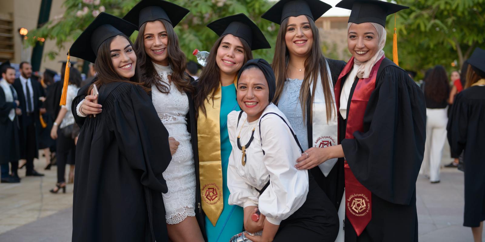 AUC graduates smile as they finish their experience at the University's 2018 Commencement Ceremony.jpg