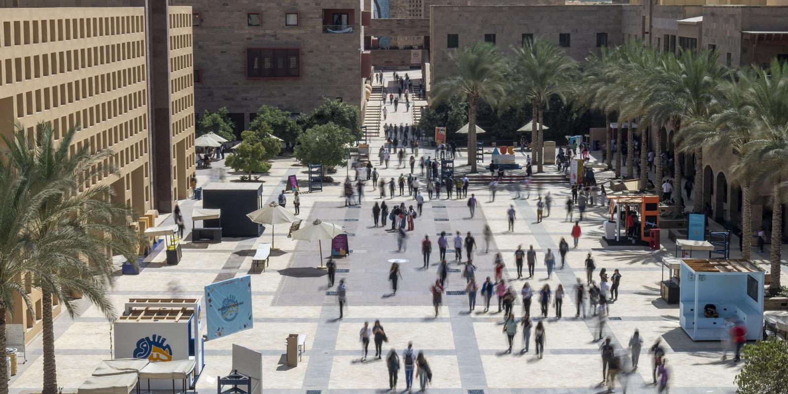 Top view of a university campus with students walking back and forth