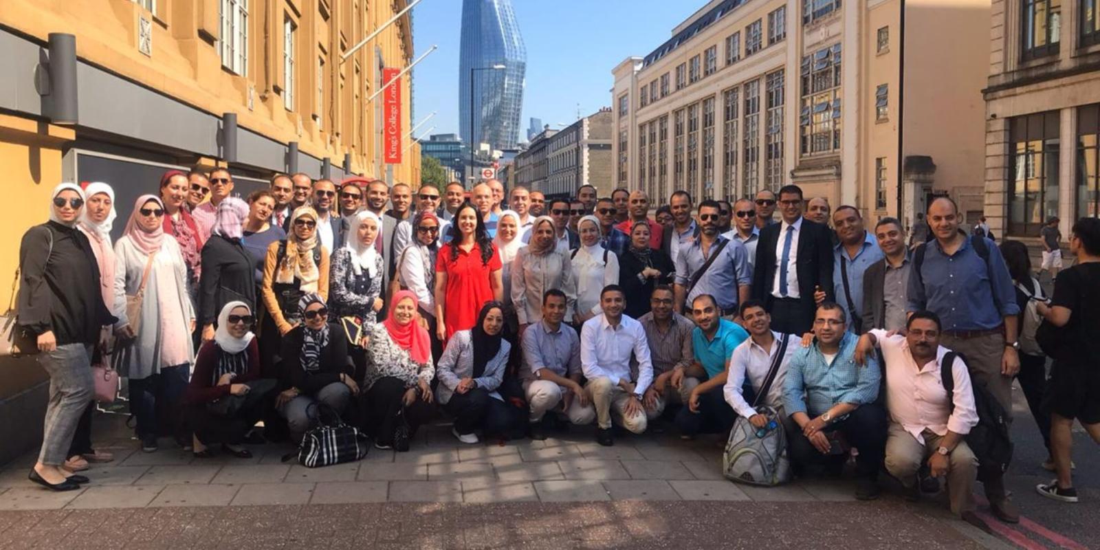 Members of the LEP program pose in a street