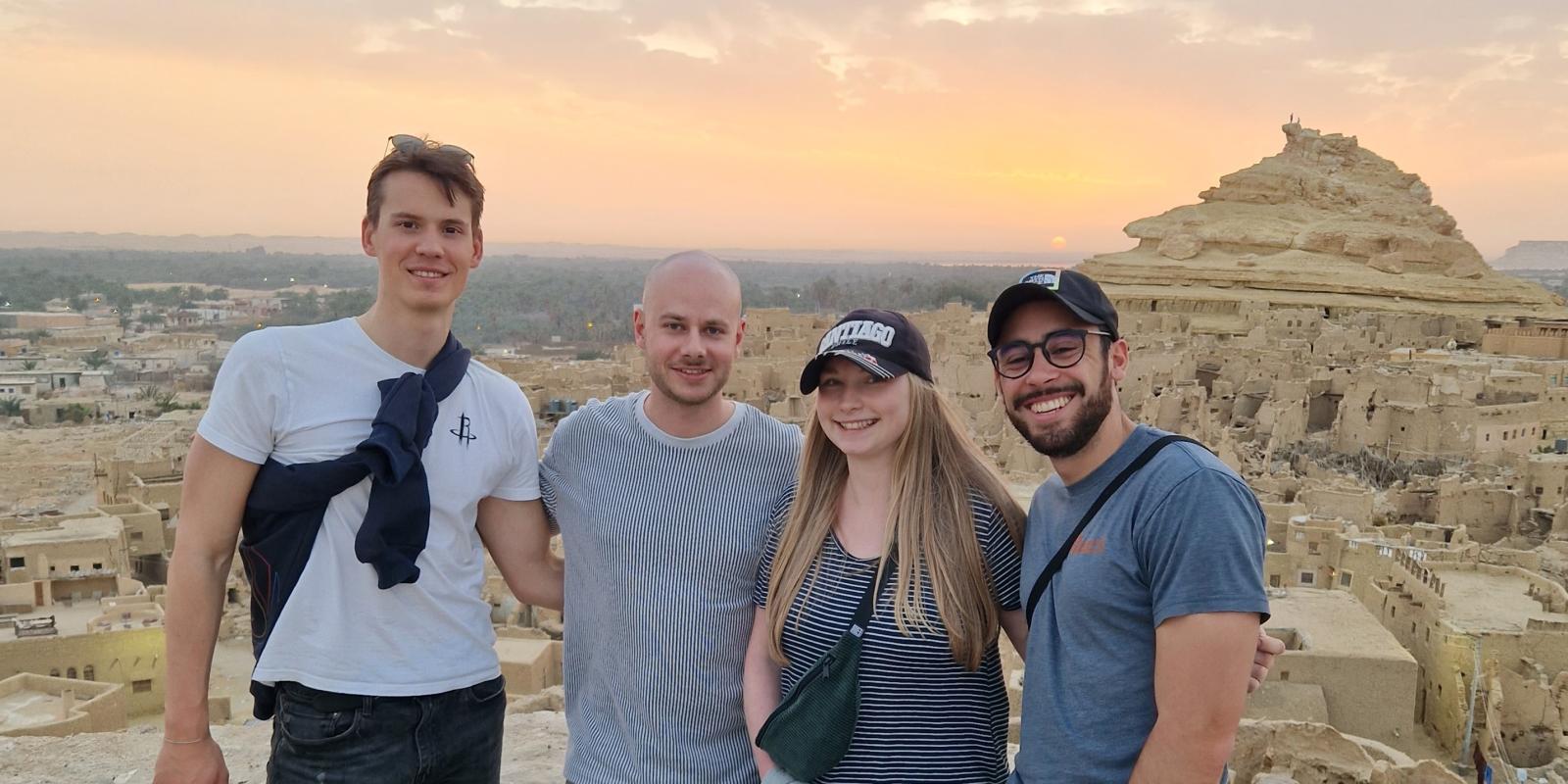 Students stand in front of Siwa