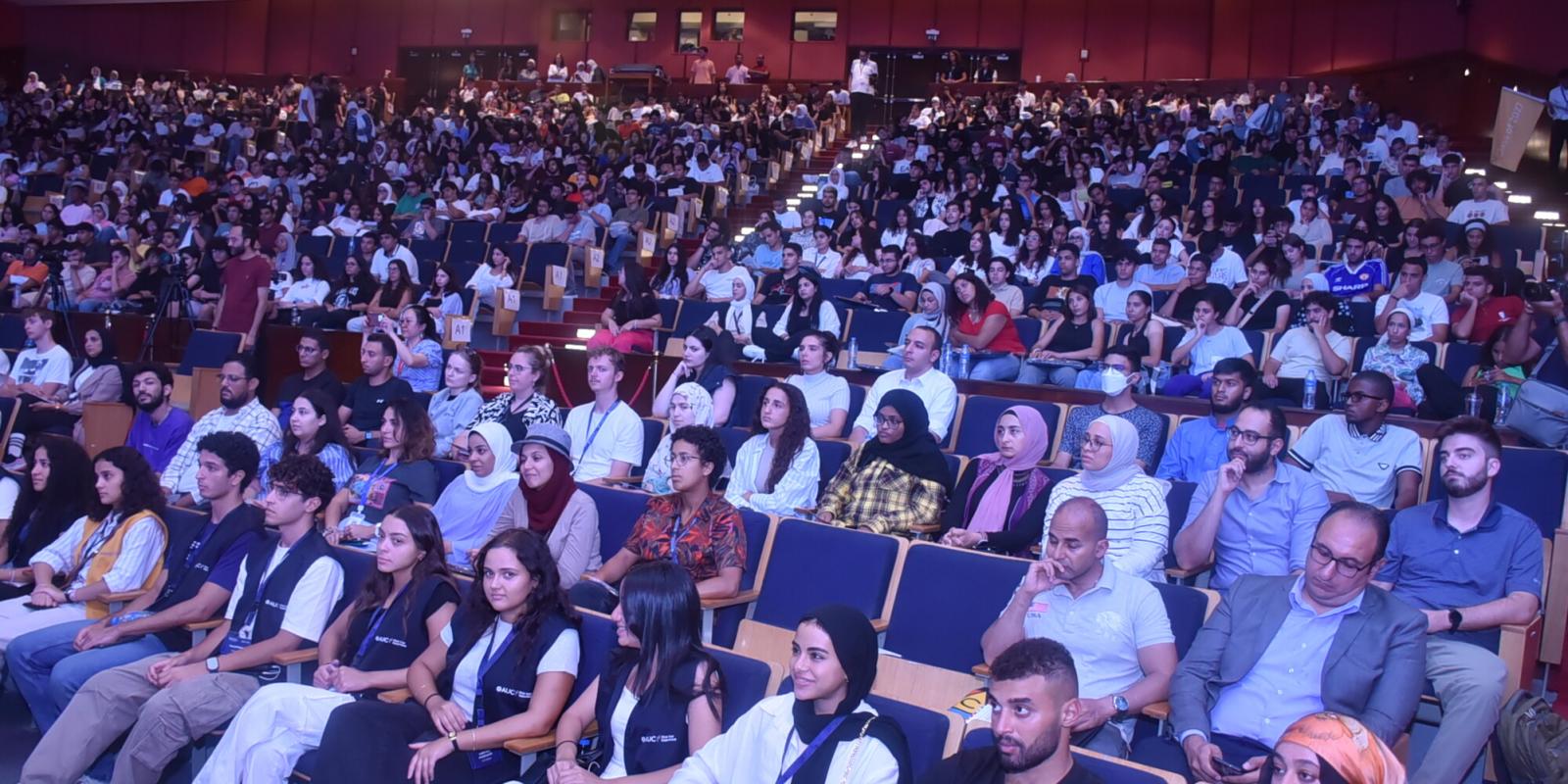 Crowd sitting in an auditorium