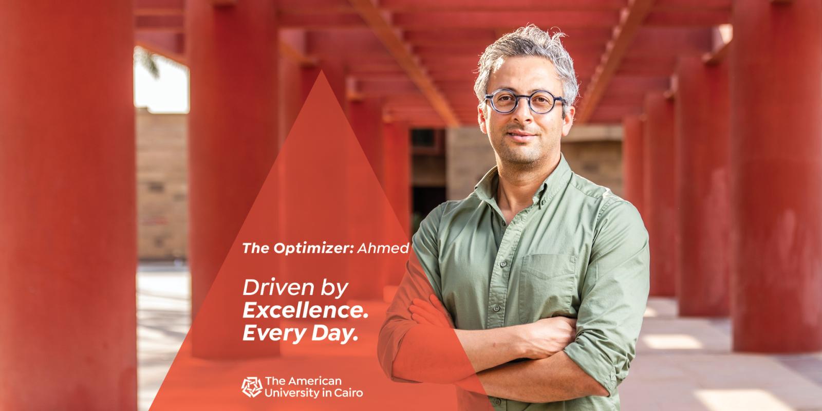 A man standing next to red pillars, text reads "The Optimizer: Ahmed. Driven by Excellence. Every Day. The American University in Cairo"