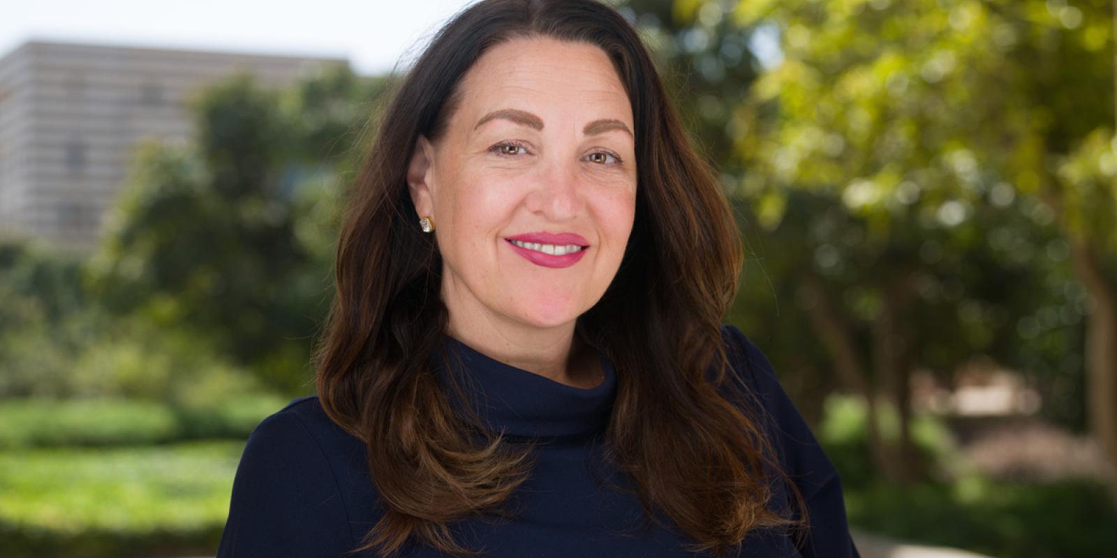 Headshot of a lady smiling
