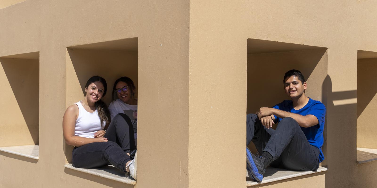 auc students sitting in the cubes on campus