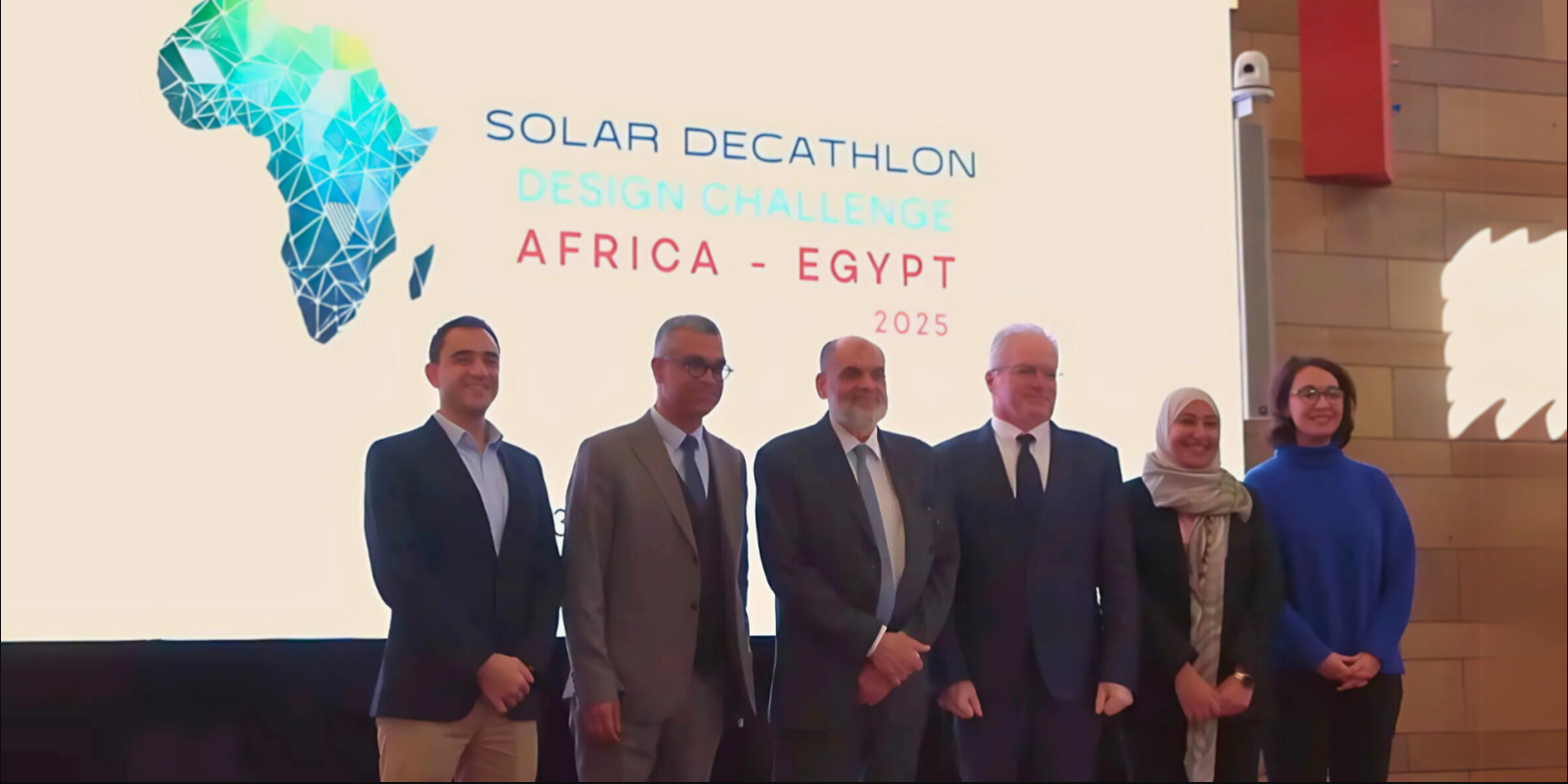 Dean of School of Sciences and Engineering Lotfi Gafar, Professors Sherif Gobram and Khaled Tarabieh in a group photo