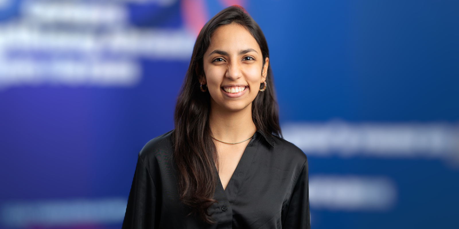 A picture of Husn Turki smiling