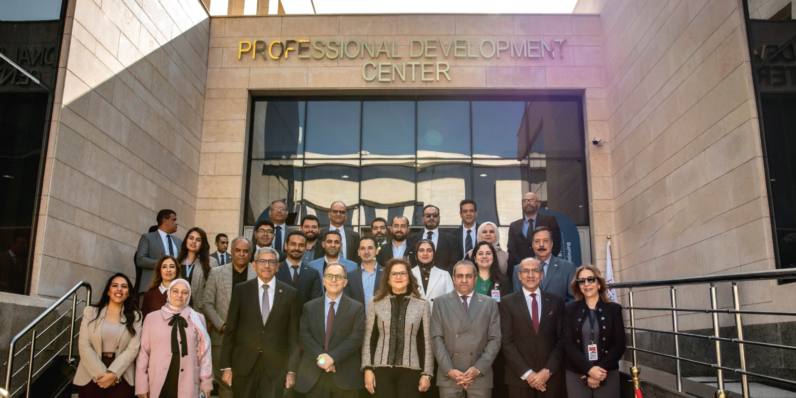 administrators standing in front of new professional development center
