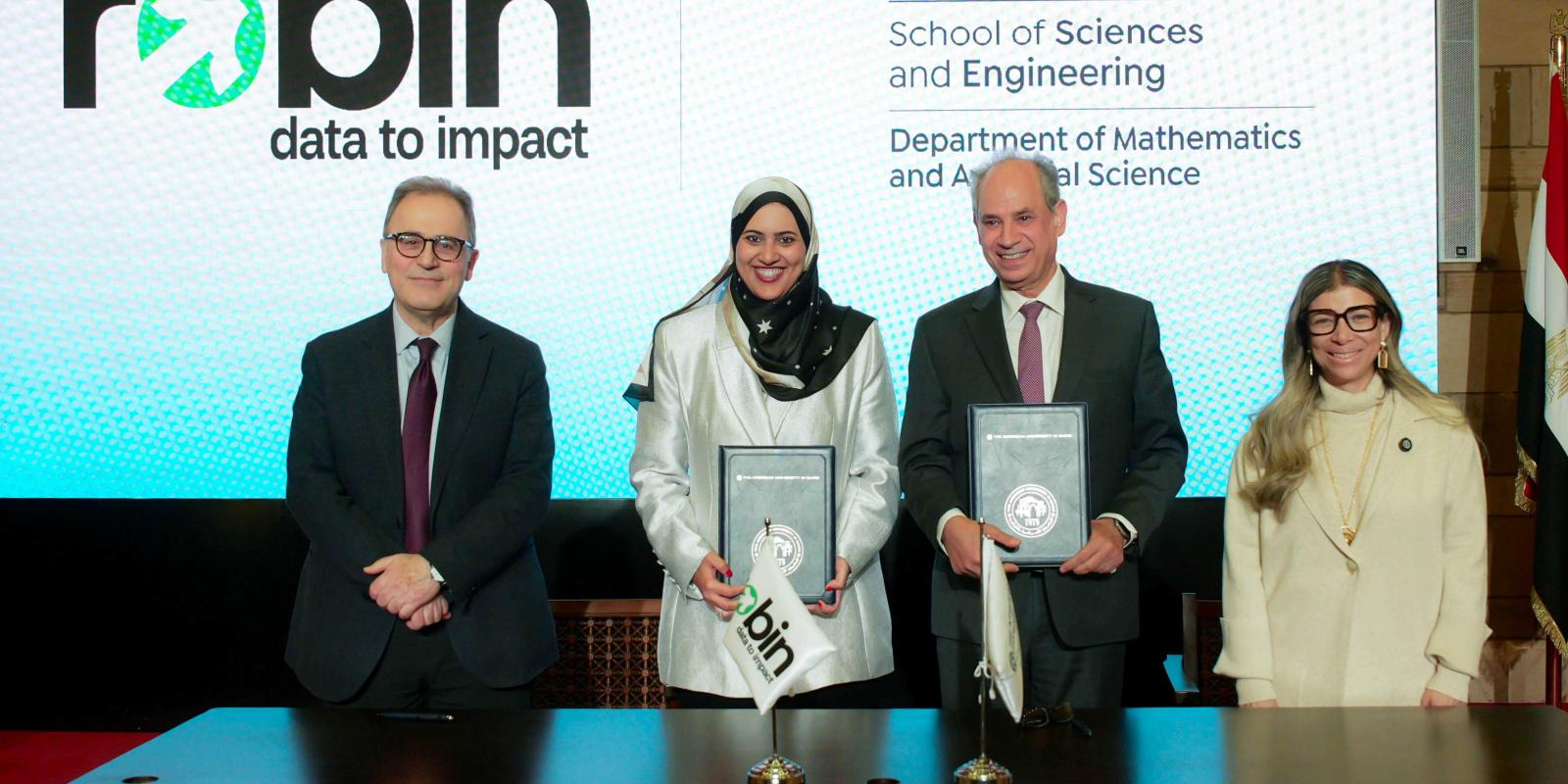 AUC President Ahmad Dallal and AUC Provost Ehab Abdel Rahman with Robin Officials