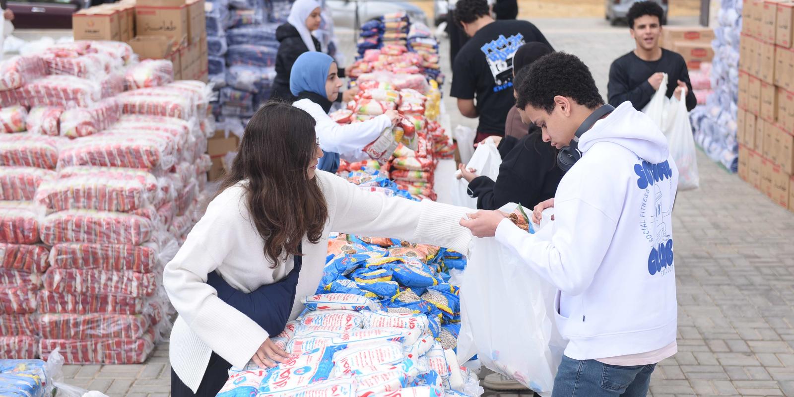 AUC students assemble a record 6000 food packs for families in need in Ramadan 2026