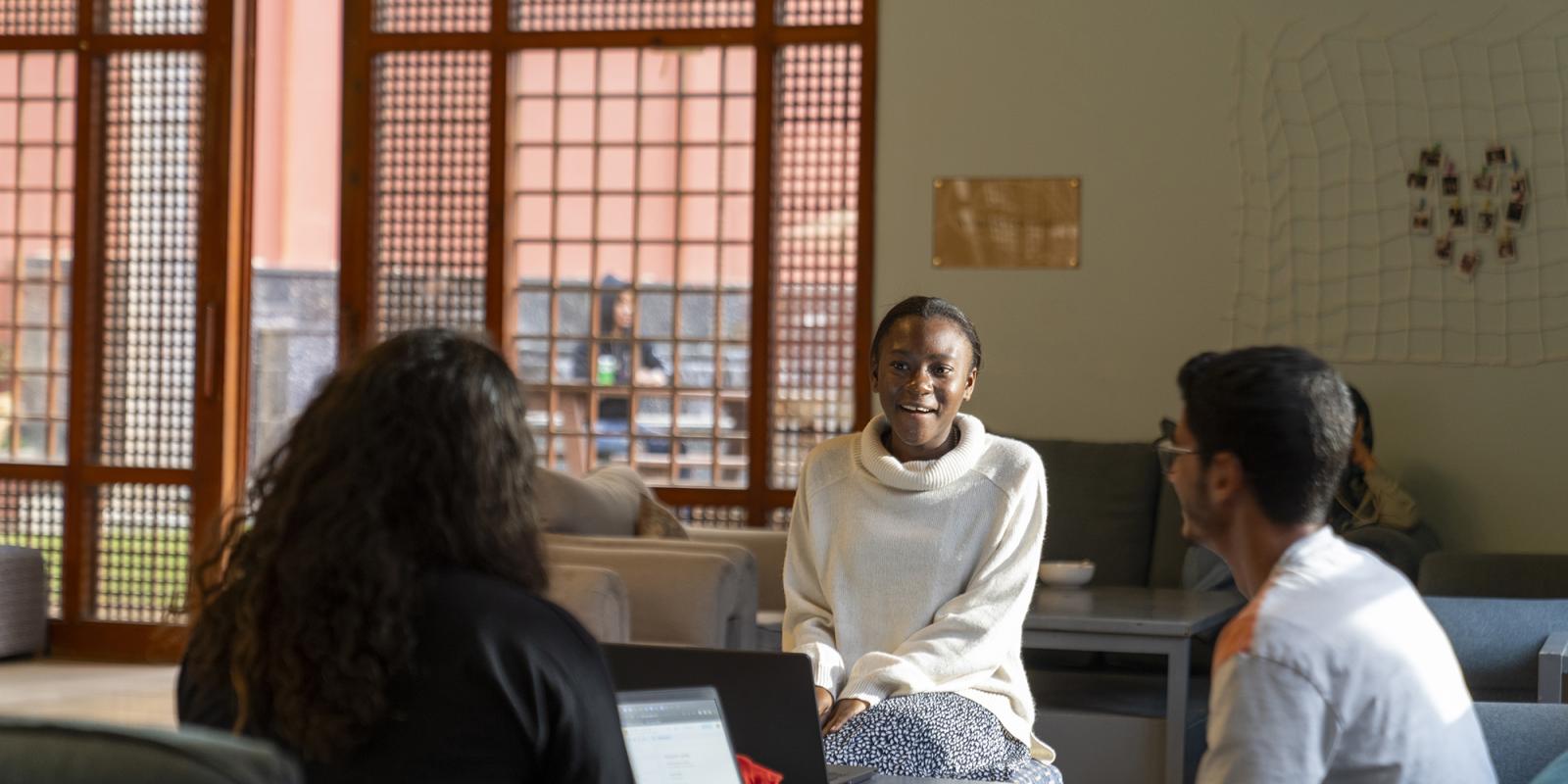 students chatting at the reslife lounge