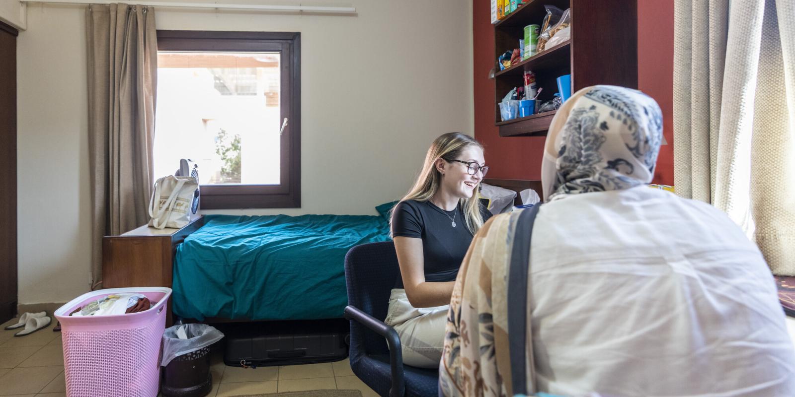 two female students in thier dorm room