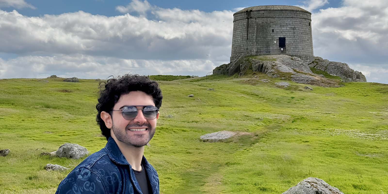 A man standing near a monument 