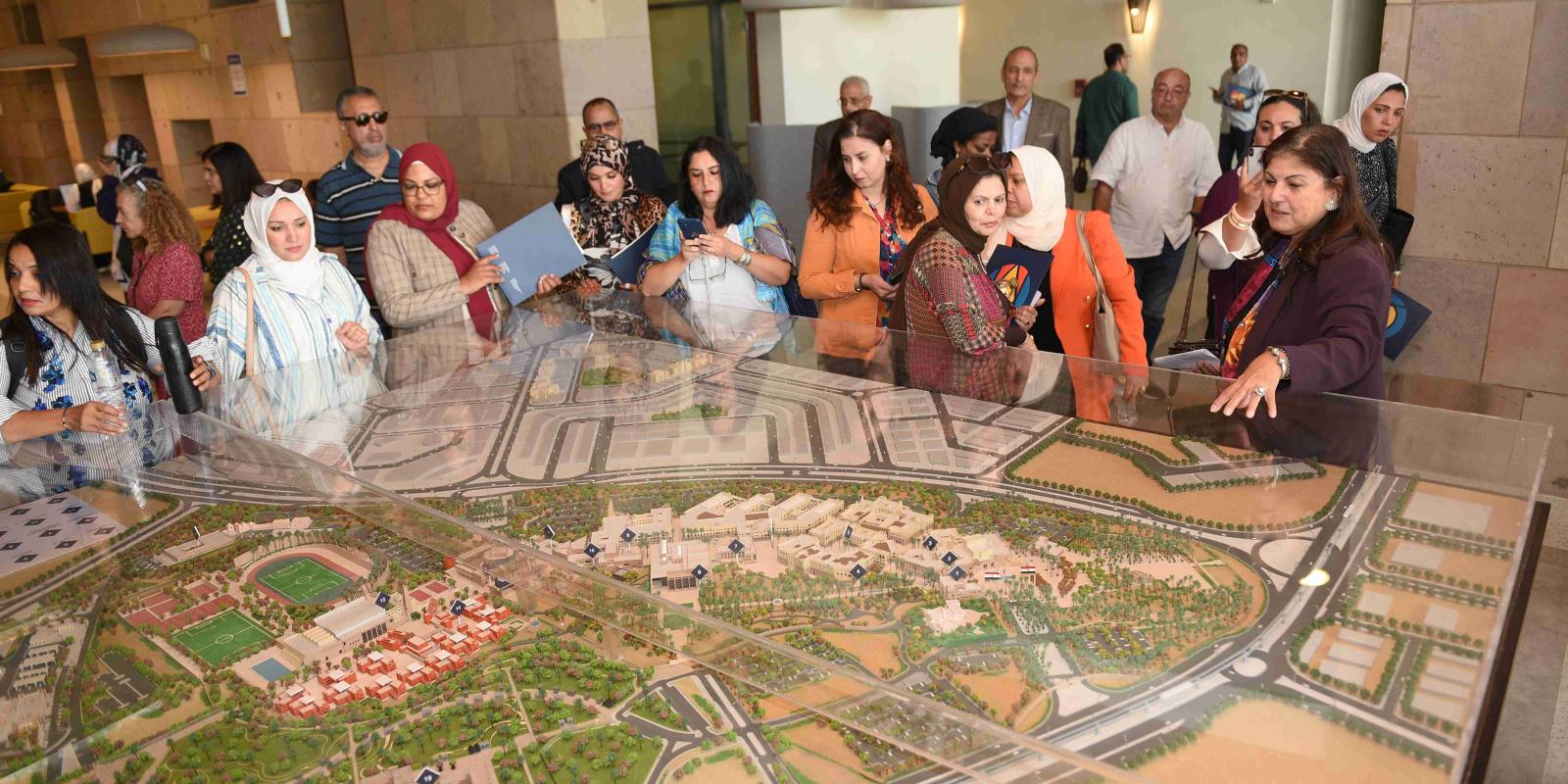 Dean of AUC Libraries Lamia Eid leading a tour for journalists in the newly transformed library 