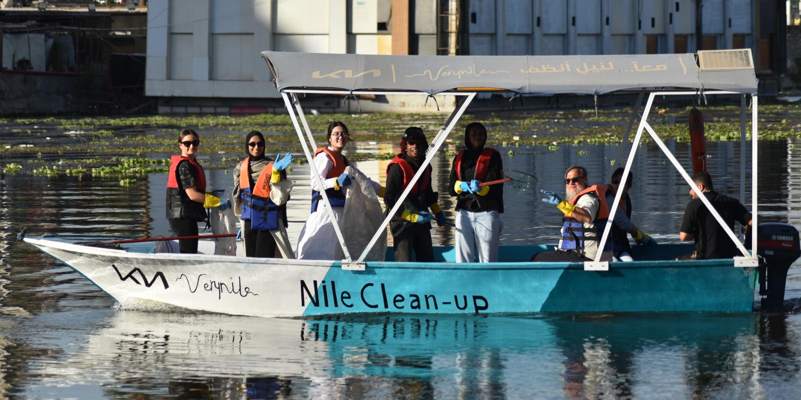 Georgetown University Qatar students on a Very Nile boat for a NIle clean-up