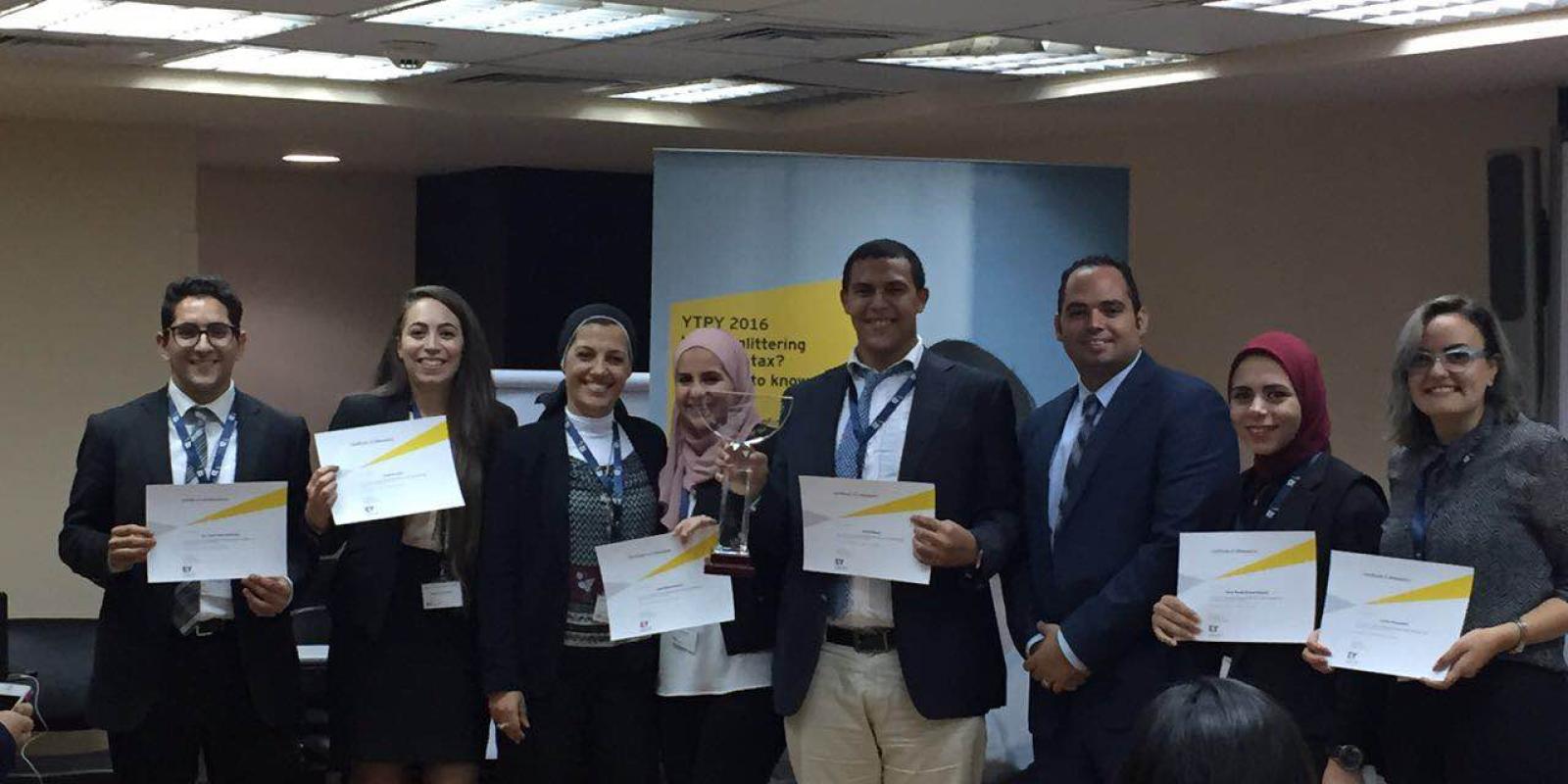 The top six finalists of the competition with HR manager and senior tax analyst at EY