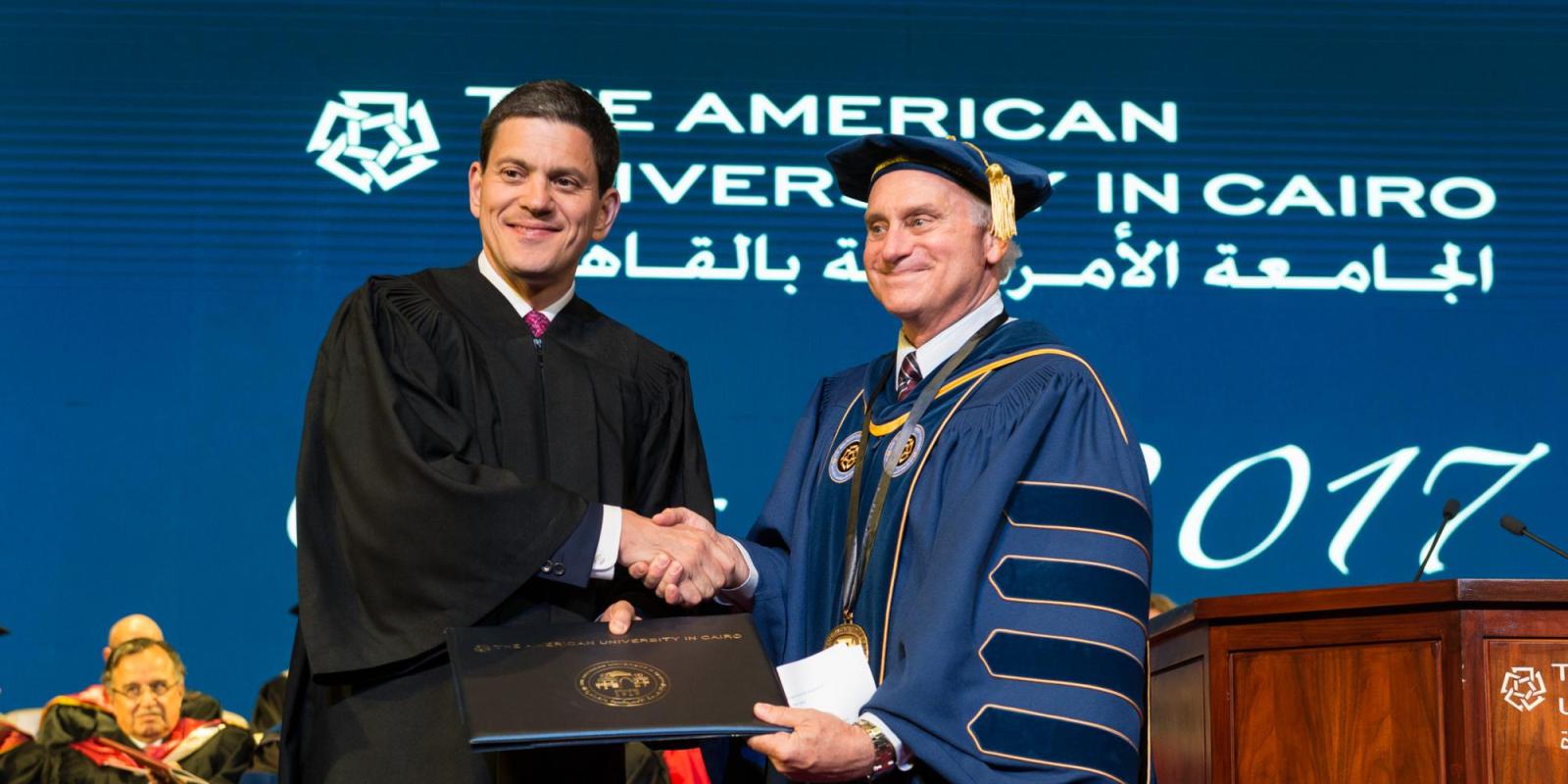 President Ricciardone presented David Miliband, president and CEO of the International Rescue Committee, with an honorary Doctor of Humane Letters (honoris causa) at the 2017 graduate commencement ceremony. 