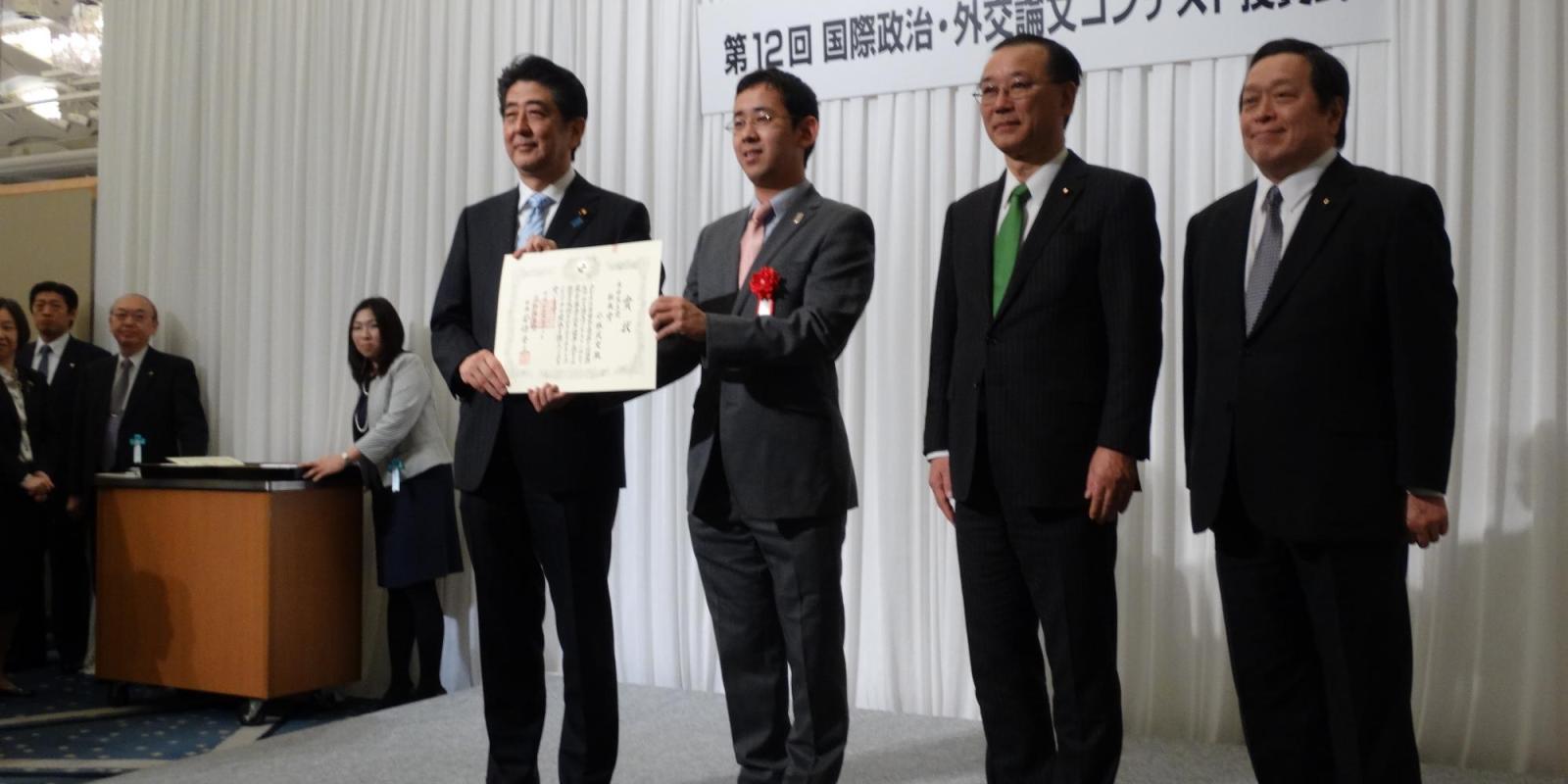 Takeshi Kobayashi awarded by Japanese Prime Minister Shinzō Abe in March for his essay on international relations