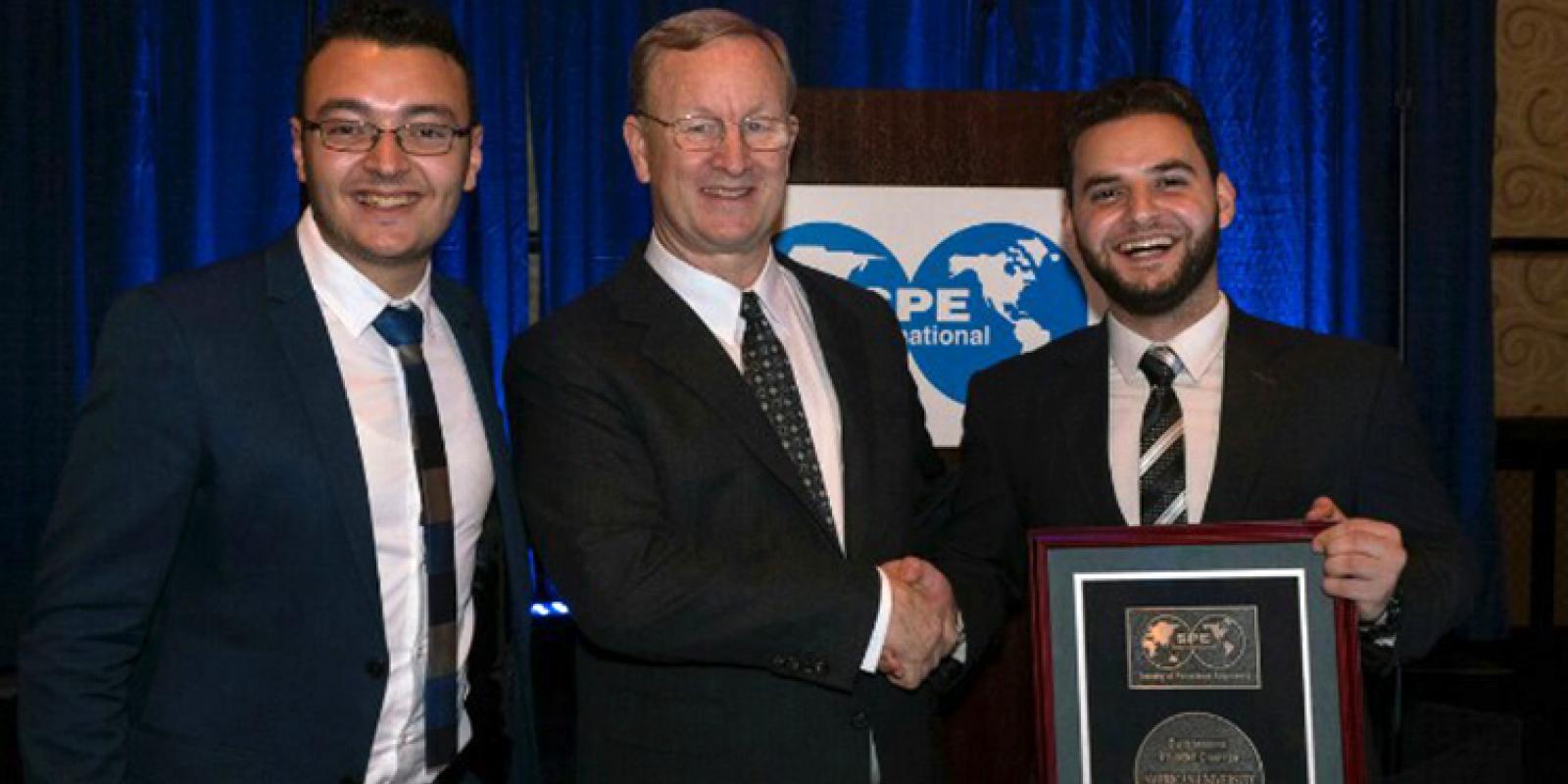 Mark Mohy, SPE International President Nathan Meehan and Omar Fathy at the Student Awards Luncheon