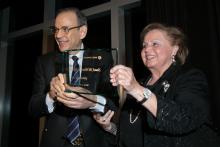 Board Chair Atef Eltoukhy '74 presents Suad Juffali with the Global Impact Award