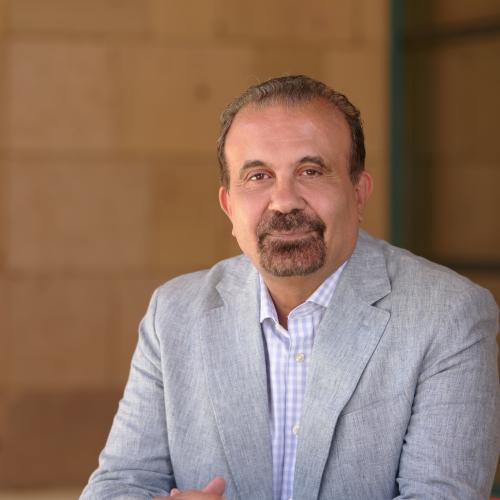 a man in a grey suit 