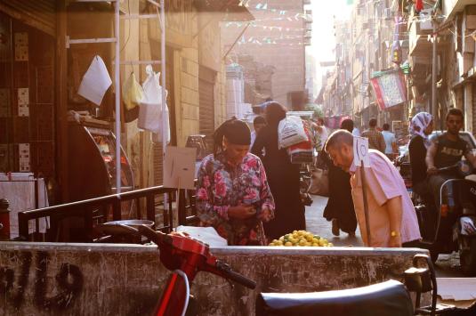 Photo of a Woman Selling Lemons in Cairo