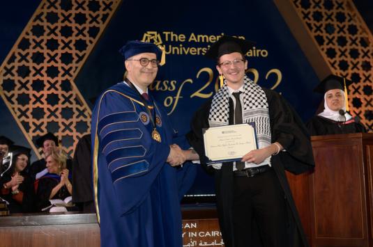 Alamir Yacoub receives the Shireen Abu Aqleh Award at commencement