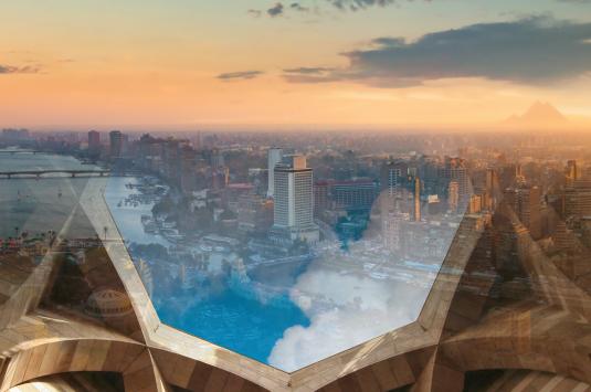 aerial view for Cairo with clouds and AUC architecture in the background, to represent climate change initiative