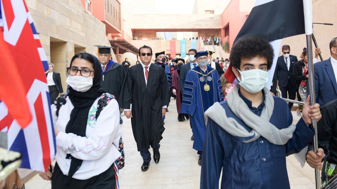 Students with flags at parade