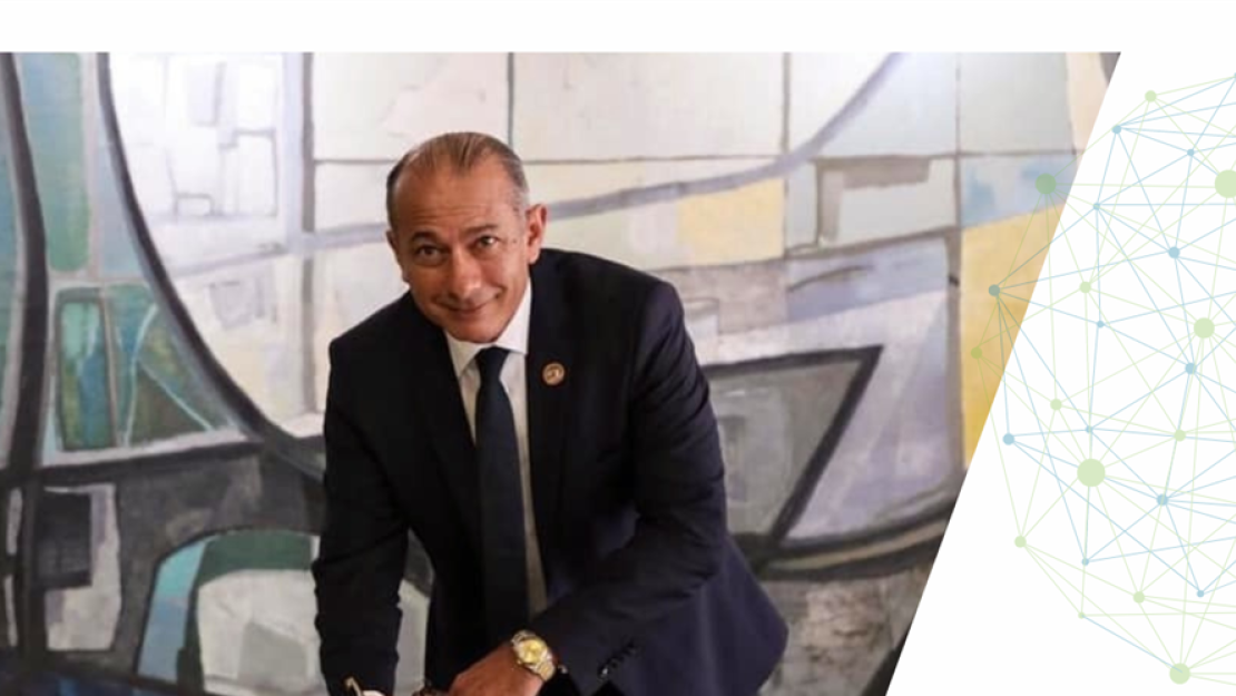 Ambassador Wael Aboulmagd, AUC climate change logo