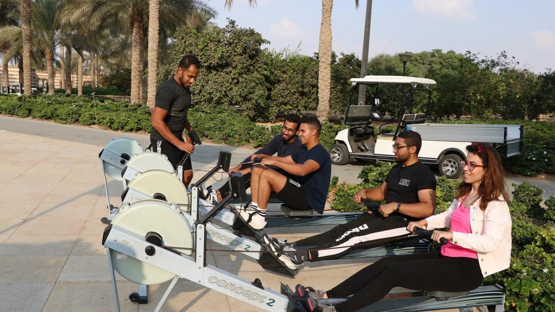 Students on rowing machines