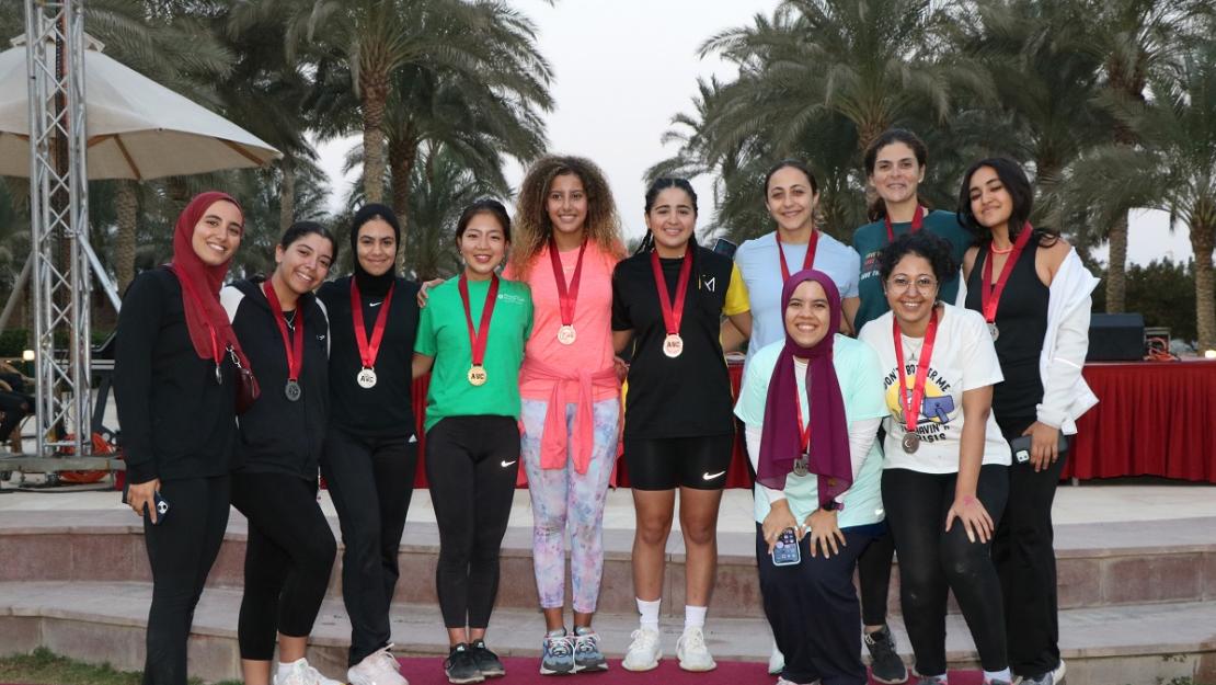 Female students wearing medals